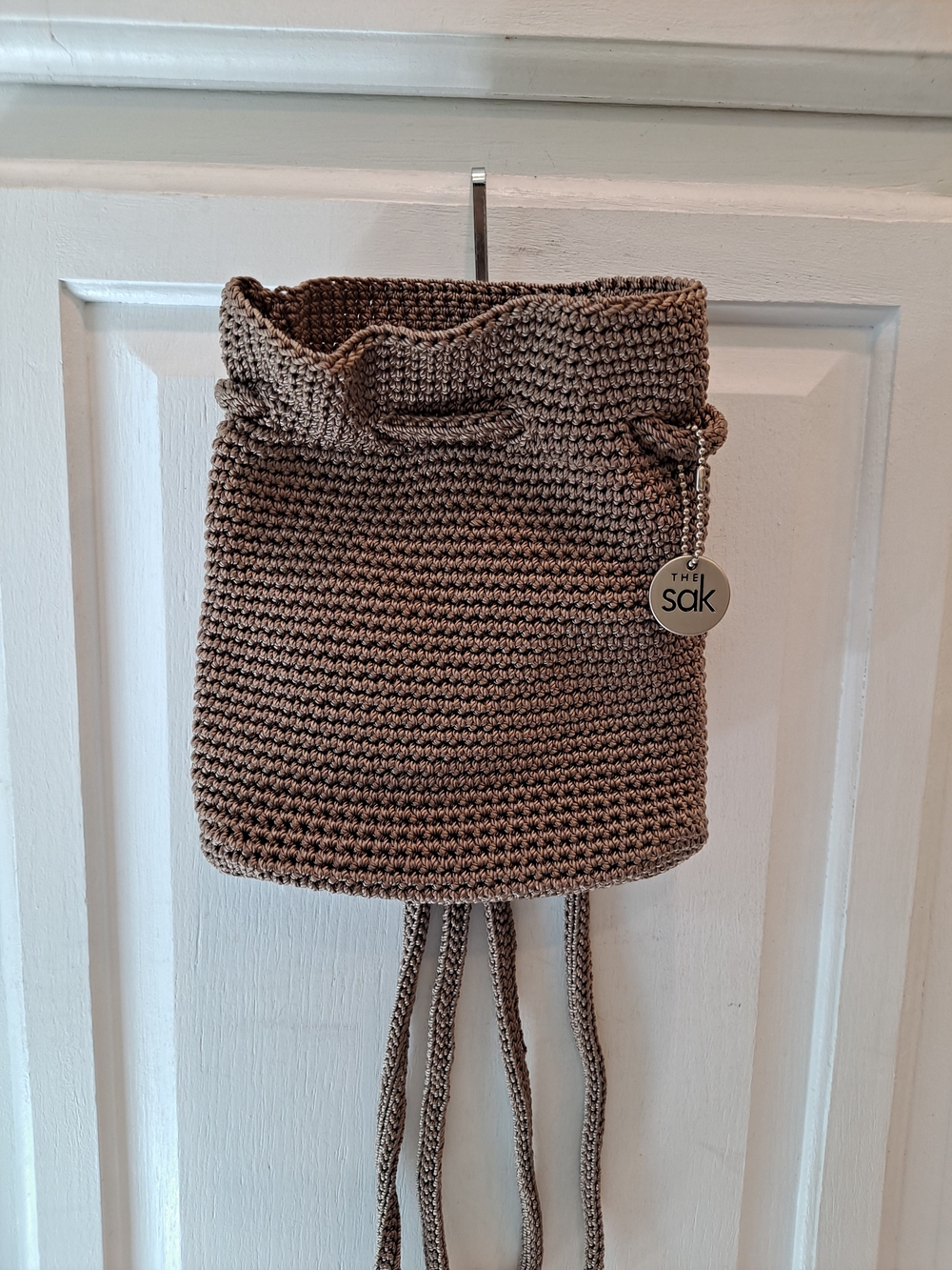 The Sak Brown Crochet Drawstring Mini Backpack